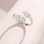 Keltischer Romantik Runenring: 925 Silber Ring mit Triskele, Zirkonia-Herzen, Runen-Gravur und offenem Wrap-Design.